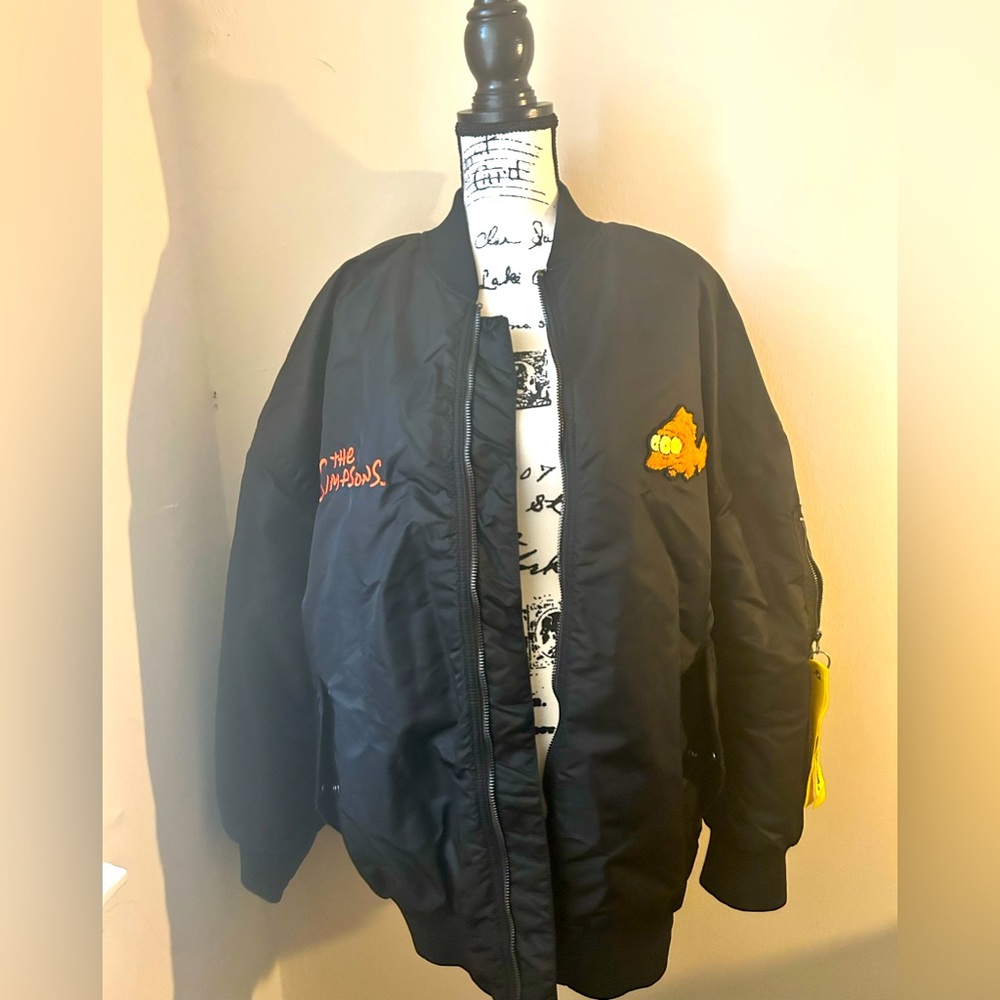 Hello, for sale is a NEW w/o tags The Simpsons long line over sized jacket.
